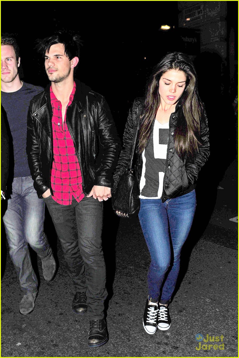 taylor lautner marie avgeropoulos matching jackets london 18